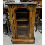 A Victorian inlaid walnut music cabinet enclosed by single glazed door, height 86 cm