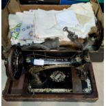 An early 20th century hand operated sewing machine bt Singer; linen; 2 Spong mincers