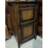 An oak music/record cupboard with single door