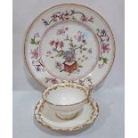 A Royal Worcester chinoiserie decorated plate and a Royal Worcester foliate gilded cup and saucer