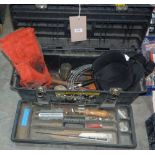 A box of miscellaneous tools, welding gloves & knee pads