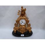 A French gilt speltar and marble mantle clock. 14' high