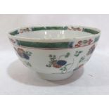 A Chinese famille-verte bowl, decorated all round with delicately painted flowers, the base with