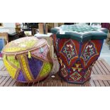 An Indian pouffe decorated with cowrie shells and a painted Moroccan occasional table