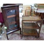 A mahogany glazed standing corner cabinet and an oak three tier tree trolley