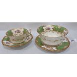 A coalport quartet, comprising cup, saucer, bowl and saucer, decorated in reserves with flower