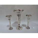 A silver trumpet flower vase by Walker and Hall, Birmingham 1926, 8' high; together with a pair of