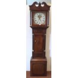 An early 19th century oak and mahogany longcase clock, the 30hr movement with painted dial signed