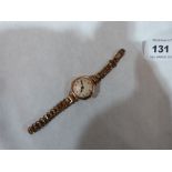 A 9ct cased lady's wristwatch with plated bracelet
