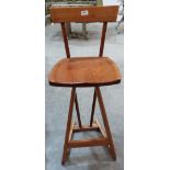 An Arts and Crafts style Craftsman fruitwood high stool