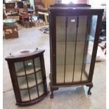 A china display cabinet and a hanging corner cabinet