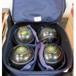 A set of four Henselite lawn bowls