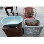 A 1920s tin infant's bath, a Travel Trunk, a loom armchair, a model of a ship and a painted zinc