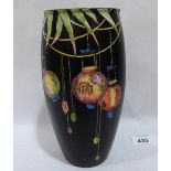 A Crown Ducal ovoid vase decorated with Chinese lanterns and bamboo on a buff black ground. 8' high