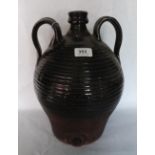 A treacle glazed earthenware two handled brewing jar. 13½' high. Prov: Estate of Islwyn Watkins