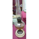 A Victorian oillamp base with cut clear glass fount