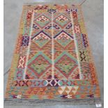 A Choli Kilim rug. 1.58m x 1.0m