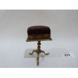 A brass miniature tripod table pin cushion. 3½' high