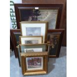 A collection of framed prints
