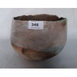 A 1970s handbuilt and sawdust smoked bowl. Probably Sue Varley. 7½' diam. Prov: Estate of Islwyn