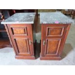 A pair of marble topped walnut bedside cabinets. Formerly pedestals to a washstand