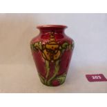 A Minton secessionist tapered vase, number 7; tube-line decorated with stylised foliage in shades of