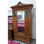 An Edward VII satin walnut single wardrobe with a base drawer. 42' wide