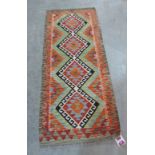 A Choli Kilim runner. 1.49m x 0.6m