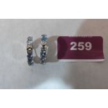 A pair of 18ct and aquamarine earrings. 10.5g gross