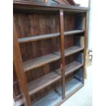 A mahogany open bookcase. 58' h x 47' w