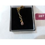 A 9ct amethyst set pendant on 9ct necklet chain. 1.6g gross