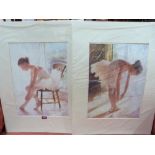 A pair of mounted prints of a ballerina. 21' x 15'