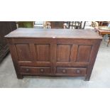 An 18th century joined oak four panel mule chest. 56' wide