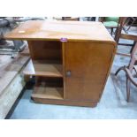 An Art-Deco style walnut island cabinet bookcase