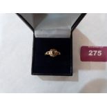 A Victorian sapphire and split pearl ring. In gold marked 18. 2.1g gross. Size N