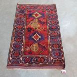 A Balochi rug. 1.25m x 0.79m