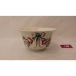 A William Moorcroft Macintyre bowl, decorated with a continuous garland of flowers and ribbon ties