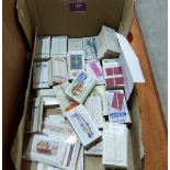 A box of cigarette cards