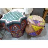 An Indian pouffe decorated with cowrie shells and a painted Moroccan occasional table