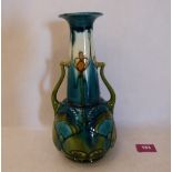 A Minton Secessionist two handled vase, number 8, tube-line decorated with stylised foliage on a