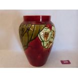 A Minton secessionist ovoid vase, number 49; tube-line decorated with stylised foliage on a red