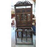A 19th century colonial carved hardwood hallstand. 88' high