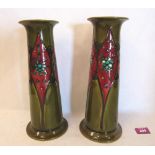 A pair of Minton secessionist tapered vases, number 1; tube-line decorated with stylised foliage