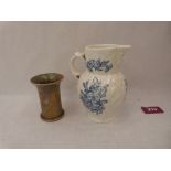 A Royal Worcester blue and white jug. 5' high and a Ruskin high fired vase. 3' high