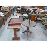 A Victorian ebonised gypsy table; a mahogany butler's tray; an oak tripod table and an oak side