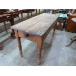 A Victorian pine kitchen table with two frieze drawers, the top 58' x 21½'
