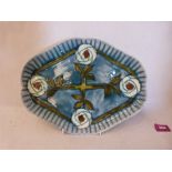 A Minton secessionist tray, number 19; tube-line decorated with stylised flowers on a blue ground.