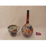 An Imari bottle vase, 6¼' high and an Imari cup