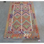 A Choli Kilim rug. 1.58m x 1.0m