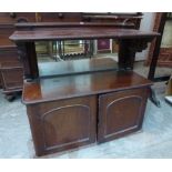 A Victorian mahogany buffet with mirror back. 48' wide